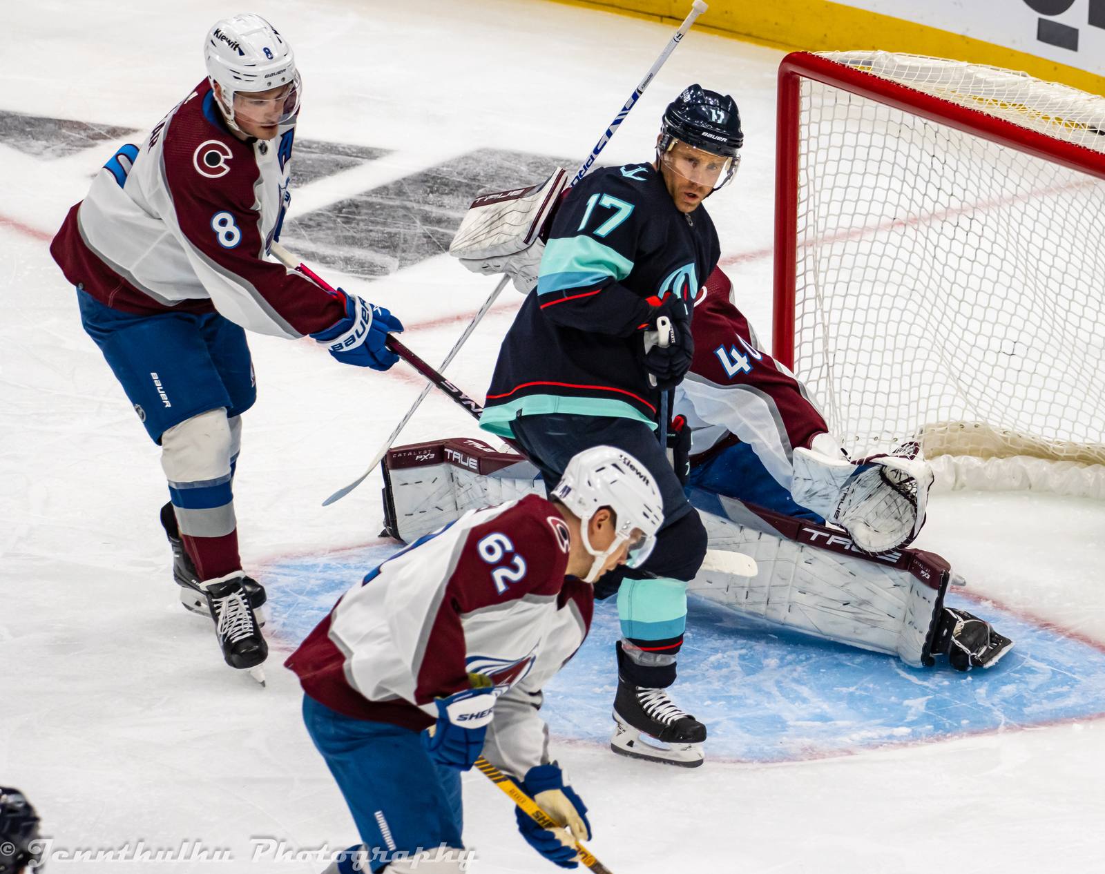 Cale Makar (8) and Artturi Lehkonen (62) defend the Avalanche net against Seattle's Jaden Schwartz in a file photograph from Game 4 of the first round of the 2023 playoffs. Lehkonen scored twice in the final minutes on Tuesday night, and Makar set up Colorado's first goal.