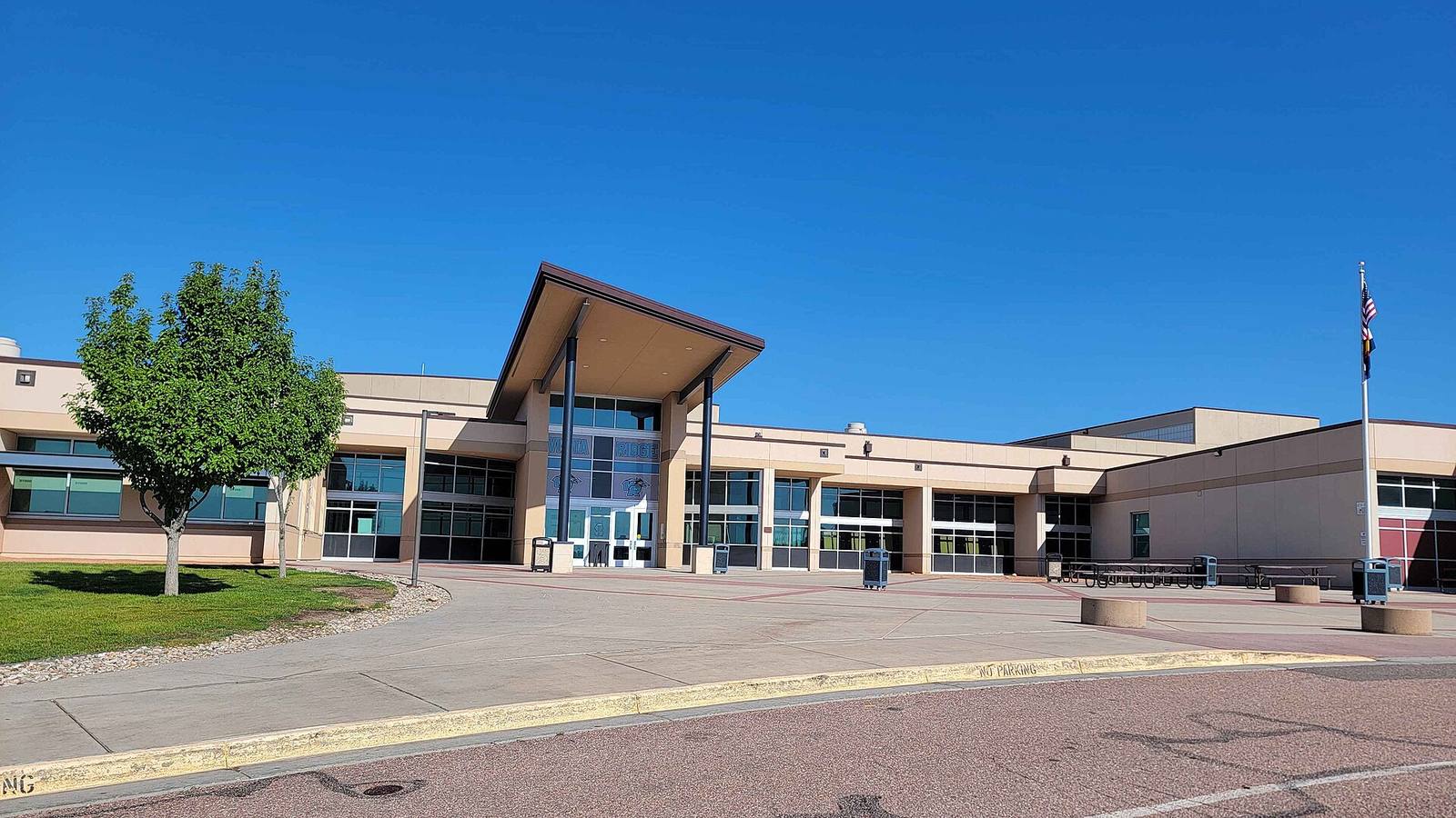 The main entrance of Vista Ridge High School in Colorado. The state's school finance formula funds 825,849 pupils at $12,325 each in FY 2026-27.